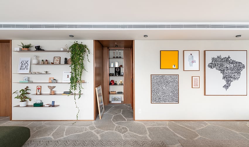 Projeto: Labra Arquitetos| Hall de entrada com elementos que criam um ambiente acolhedor aos moradores e visitantes