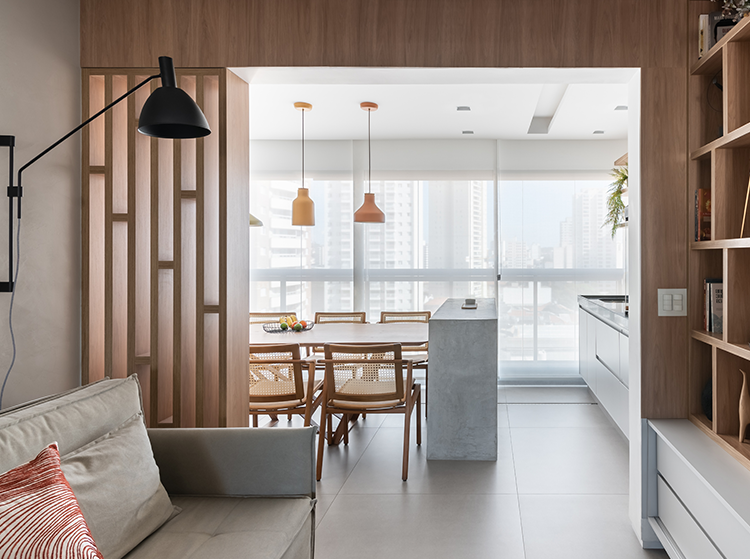 Projeto: Bruna Blanco | A integração dos espaços favoreceu a unidade e a entrada.de iluminação natural na área social.