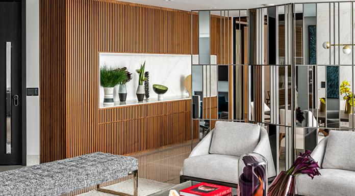 Elegância contemporânea em um refúgio urbano assinado pela Érica Salguero Projeto: Érica Salguero | O living apresenta mobiliário de linhas elegantes e paleta de cores atemporais, resultando em uma atmosfera acolhedora e contemporânea.