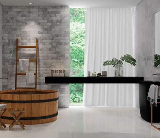 Porcelanato marmorizado: cores, acabamentos e como usar no seu projeto Marmorizado cinza é neutro, mas ganha presença com iluminação direcionada – Foto: Portinari