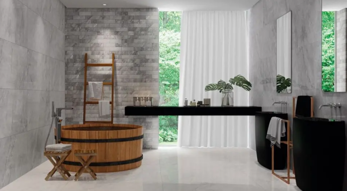 Porcelanato marmorizado: cores, acabamentos e como usar no seu projeto Marmorizado cinza é neutro, mas ganha presença com iluminação direcionada – Foto: Portinari